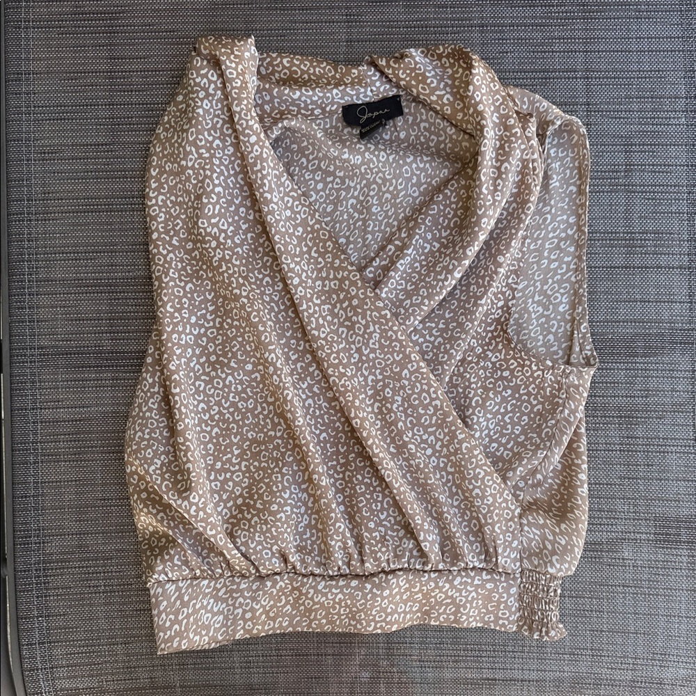 silky wrap animal print sleeveless blouse